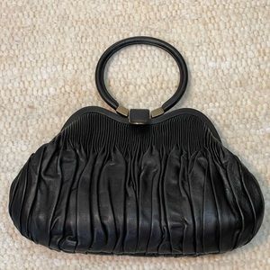 Isabella Fiore Leather Purse with a Round Handle